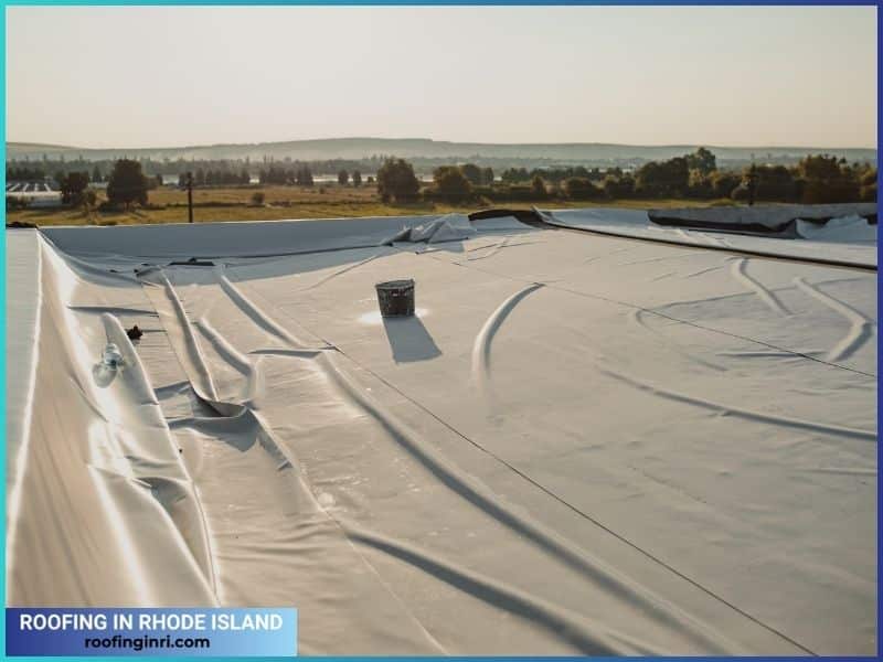A water-resistant membrane positioned on the roof